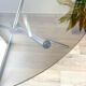 Round tripod table in smoked glass Roche Bobois 70