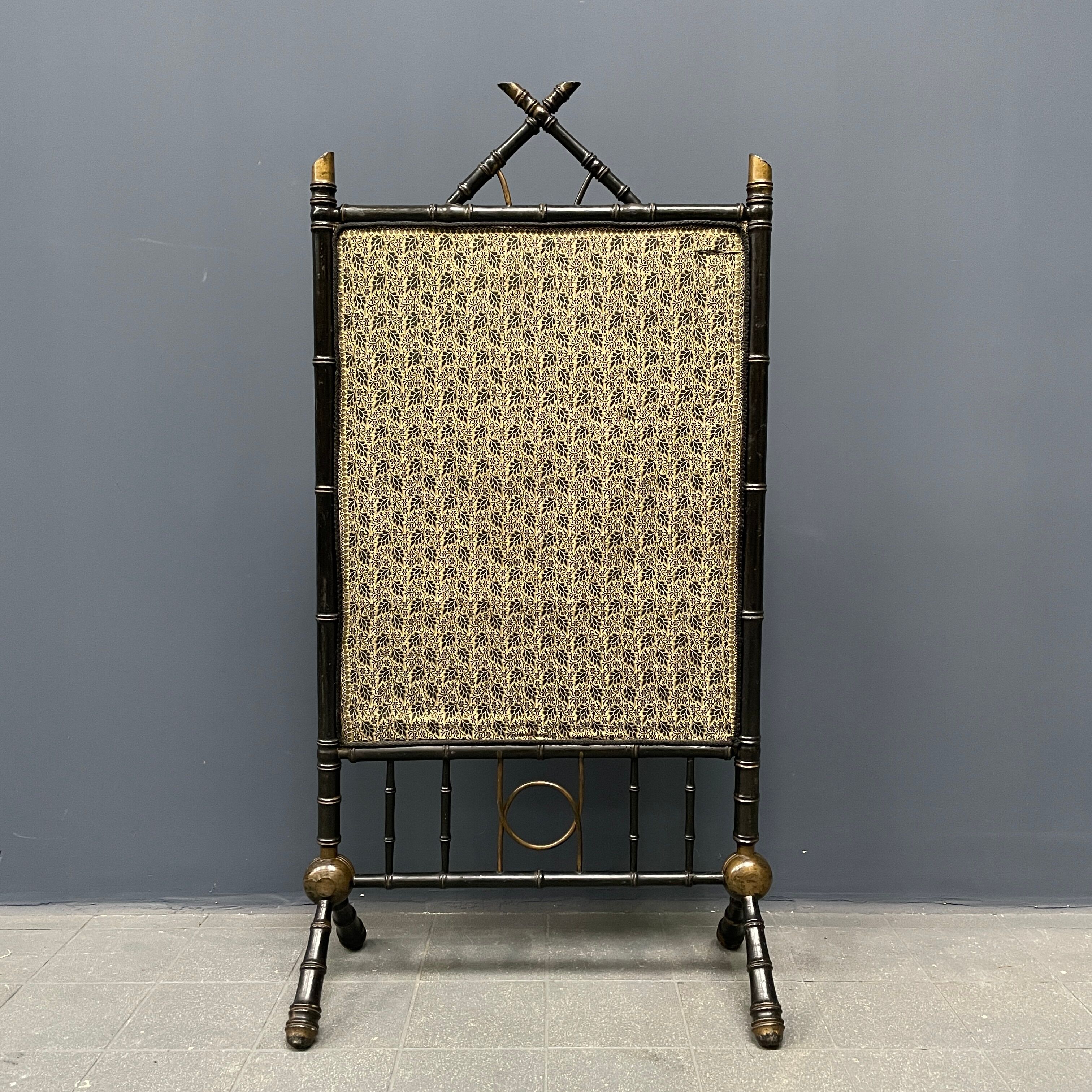 Antique black and gold faux bamboo fireplace screen