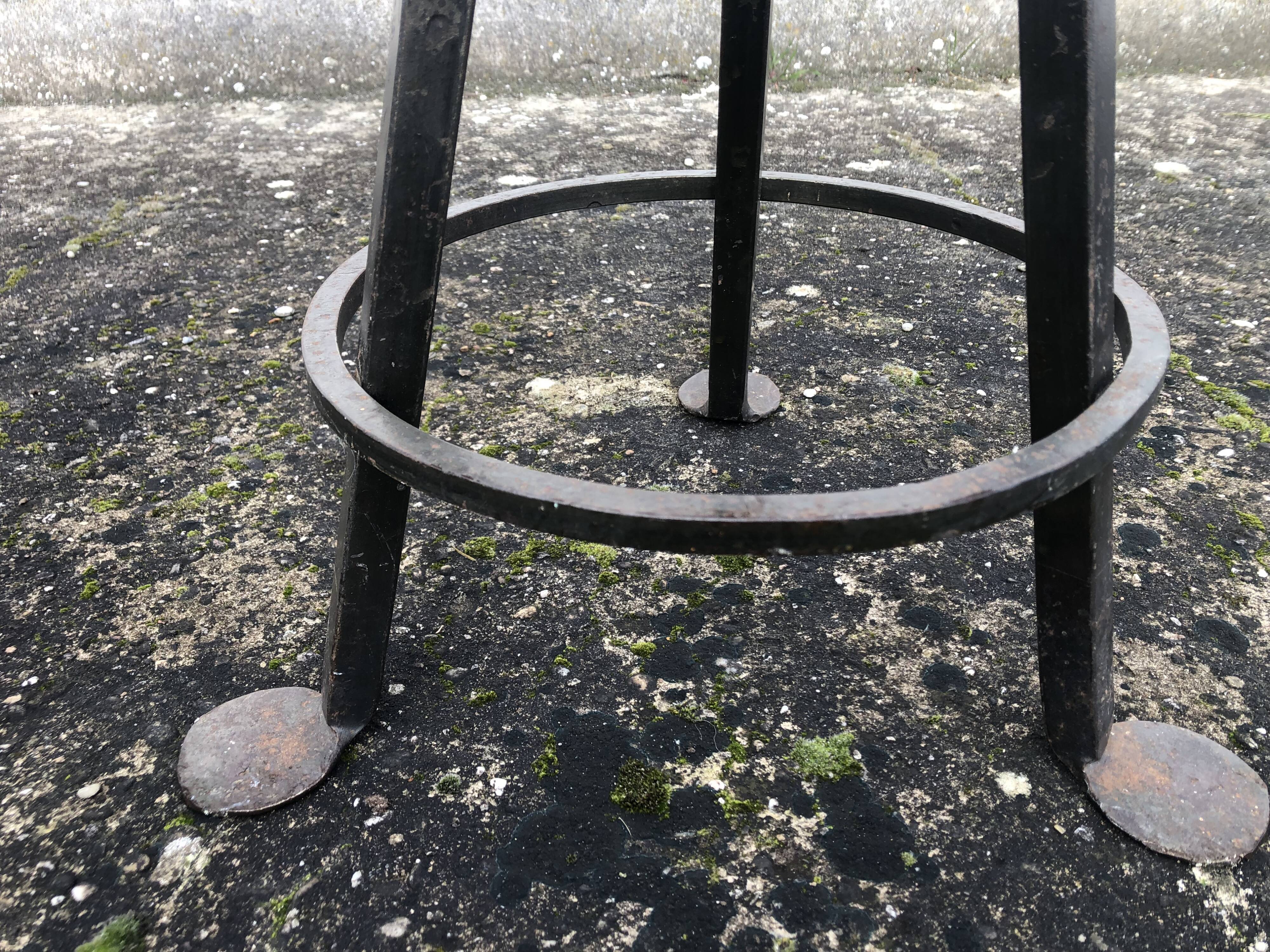 Vintage leather and wrought iron bar stools