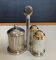 Vintage metal silver-plated and brass salt and pepper set.