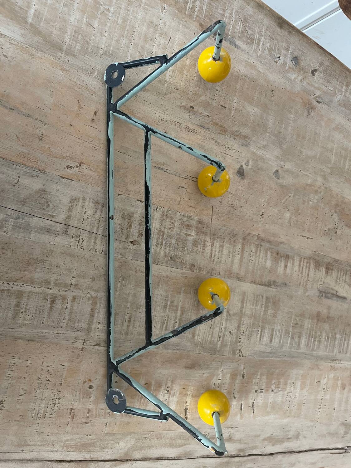 Vintage iron and wood wall coat rack