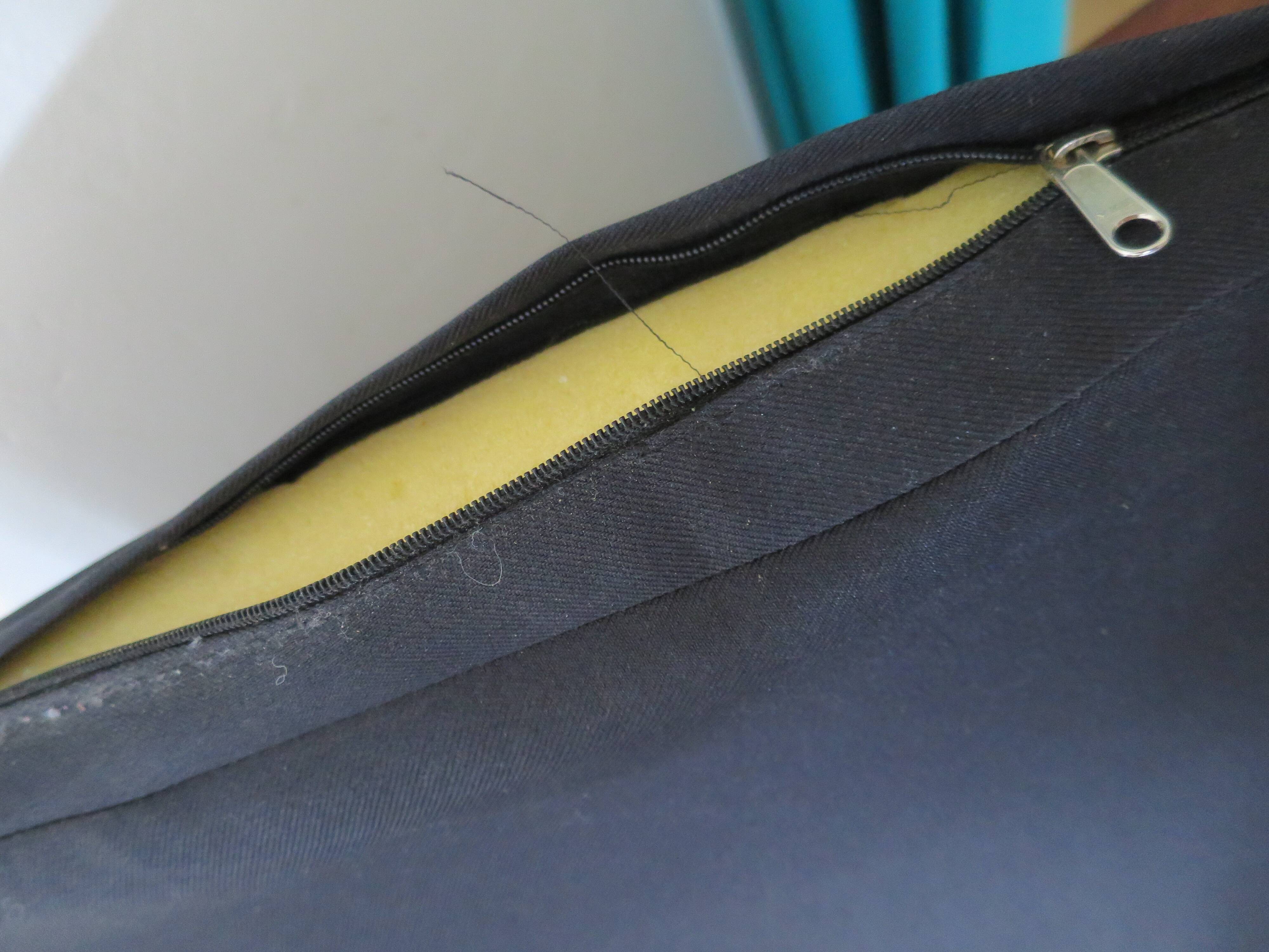 2 colonial-style armchairs in woven rattan and exotic wood