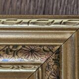 Golden frame with purple floral patterns