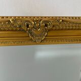 Bevelled mirror, golden empire style 74x64cm