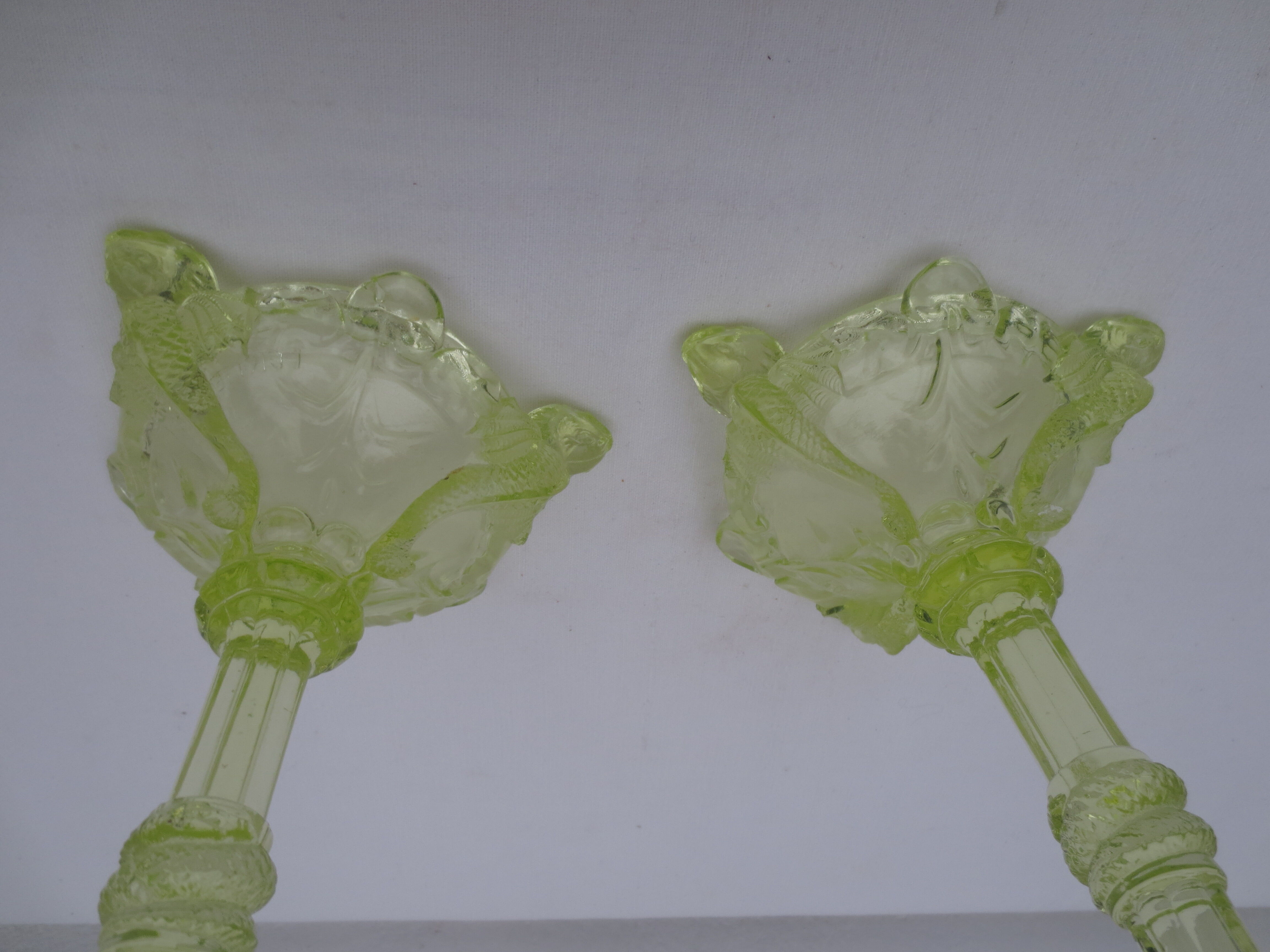 pair of old anise-green glass candlesticks