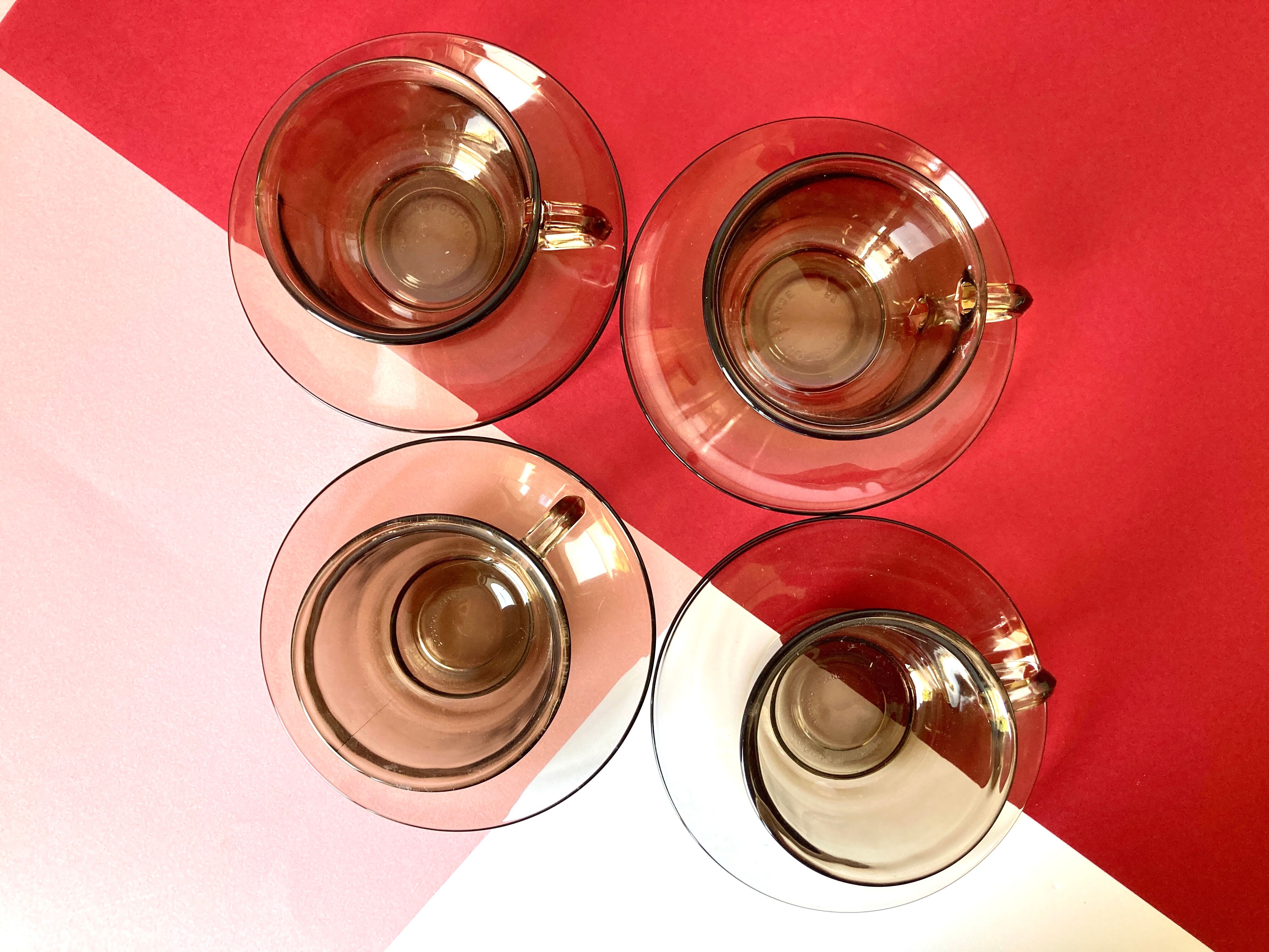 4 Arcoroc coffee cups and saucers in black transparent glass