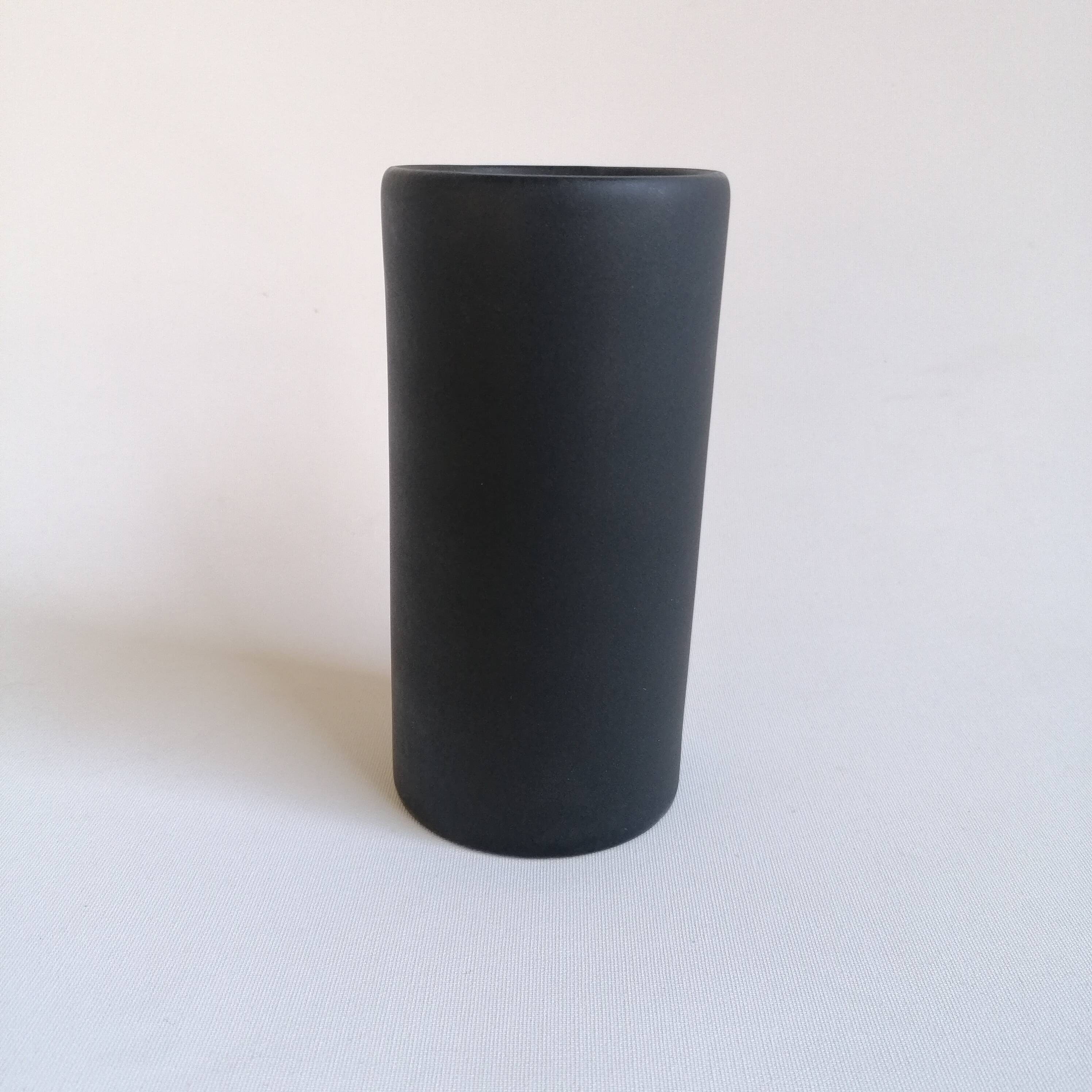 Matte black scroll vase by Antonio Lampecco