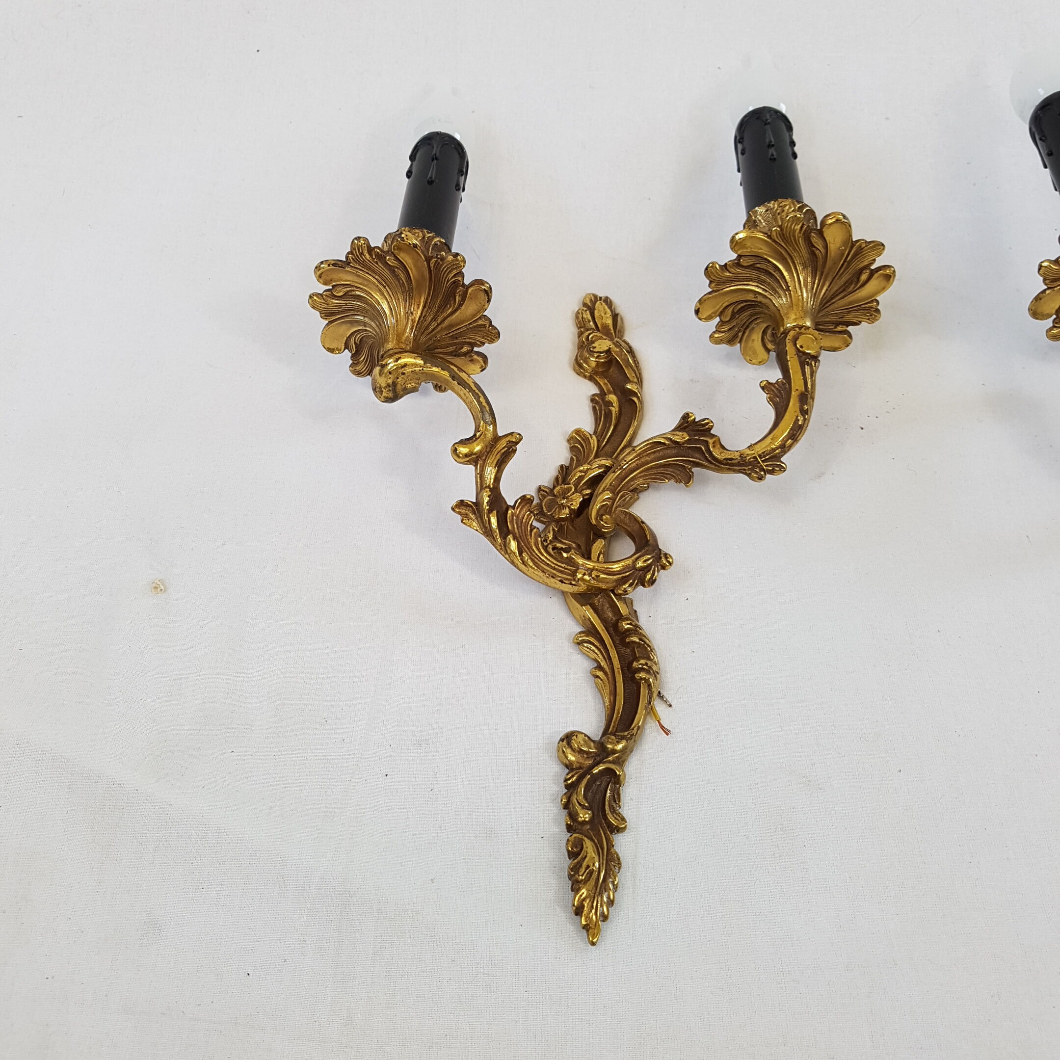 Pair of Louis XV style bronze wall lamps