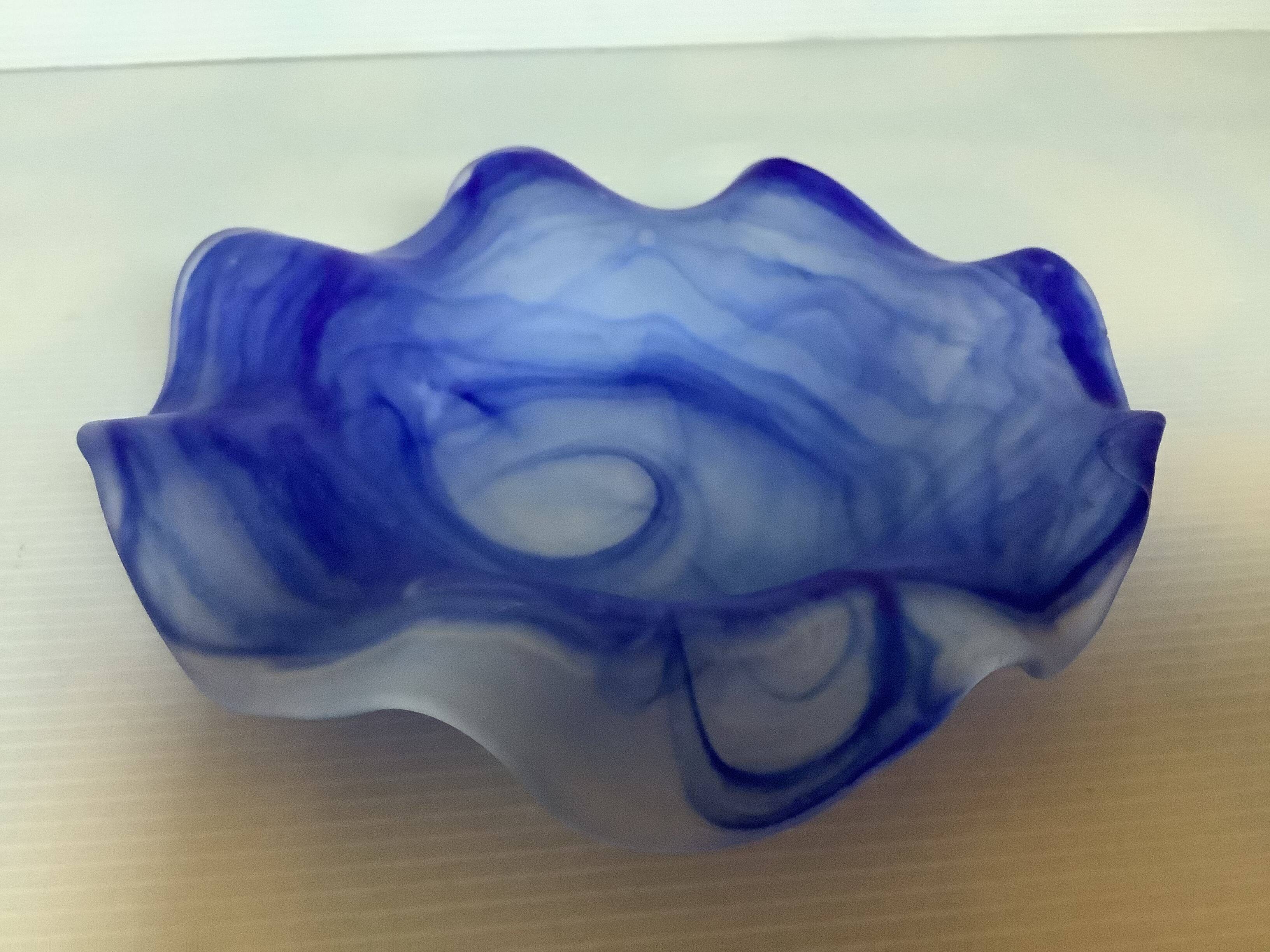 Cobalt blue glass ring with a scalloped edge