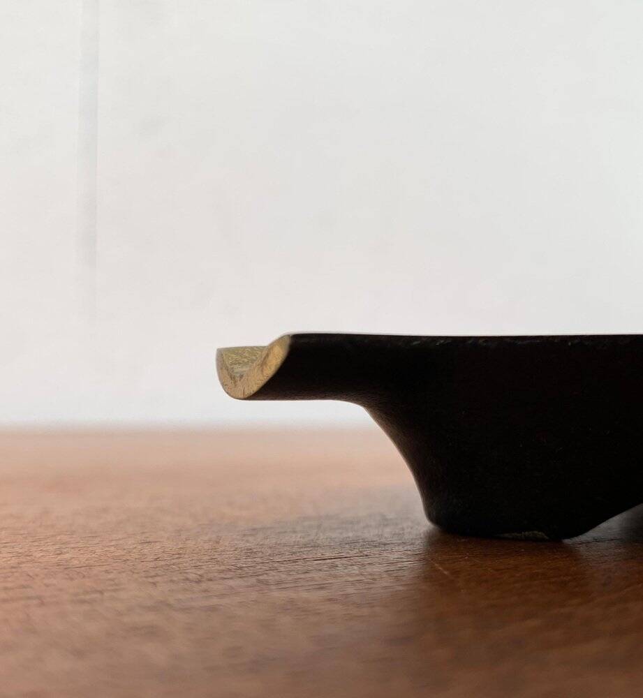 German brass ashtray with cigar cutter, 1950s.