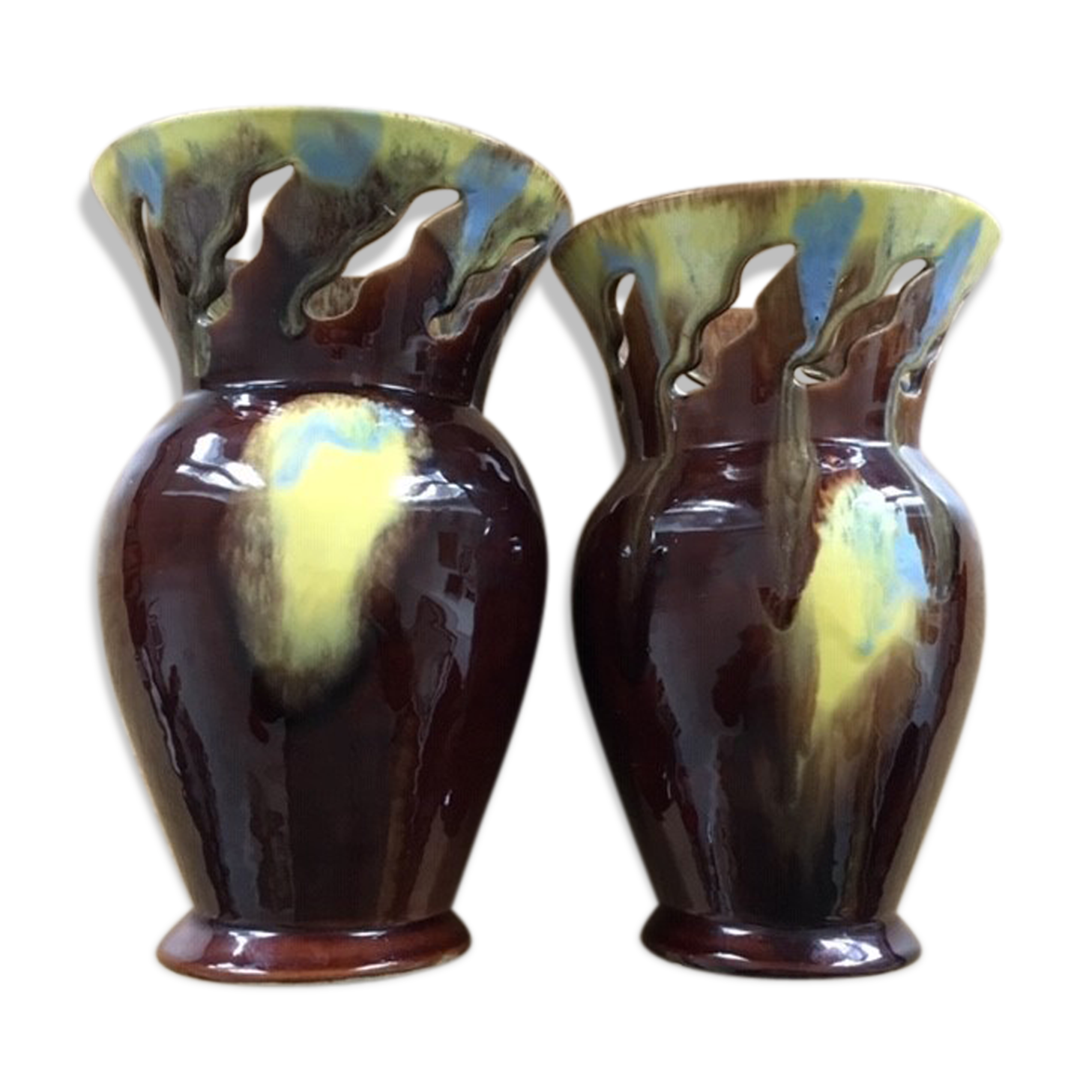 Pair of flaming ceramic vases
