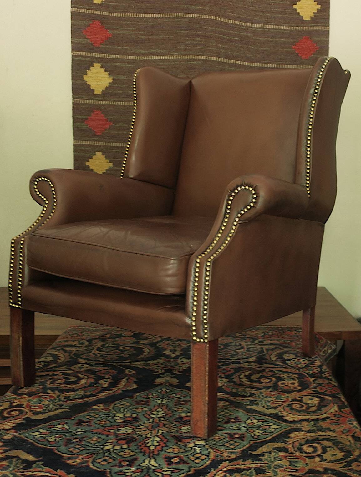 Vintage wingback lounge chair in brown leather, 1970s