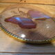Curved oval frame with blue butterfly