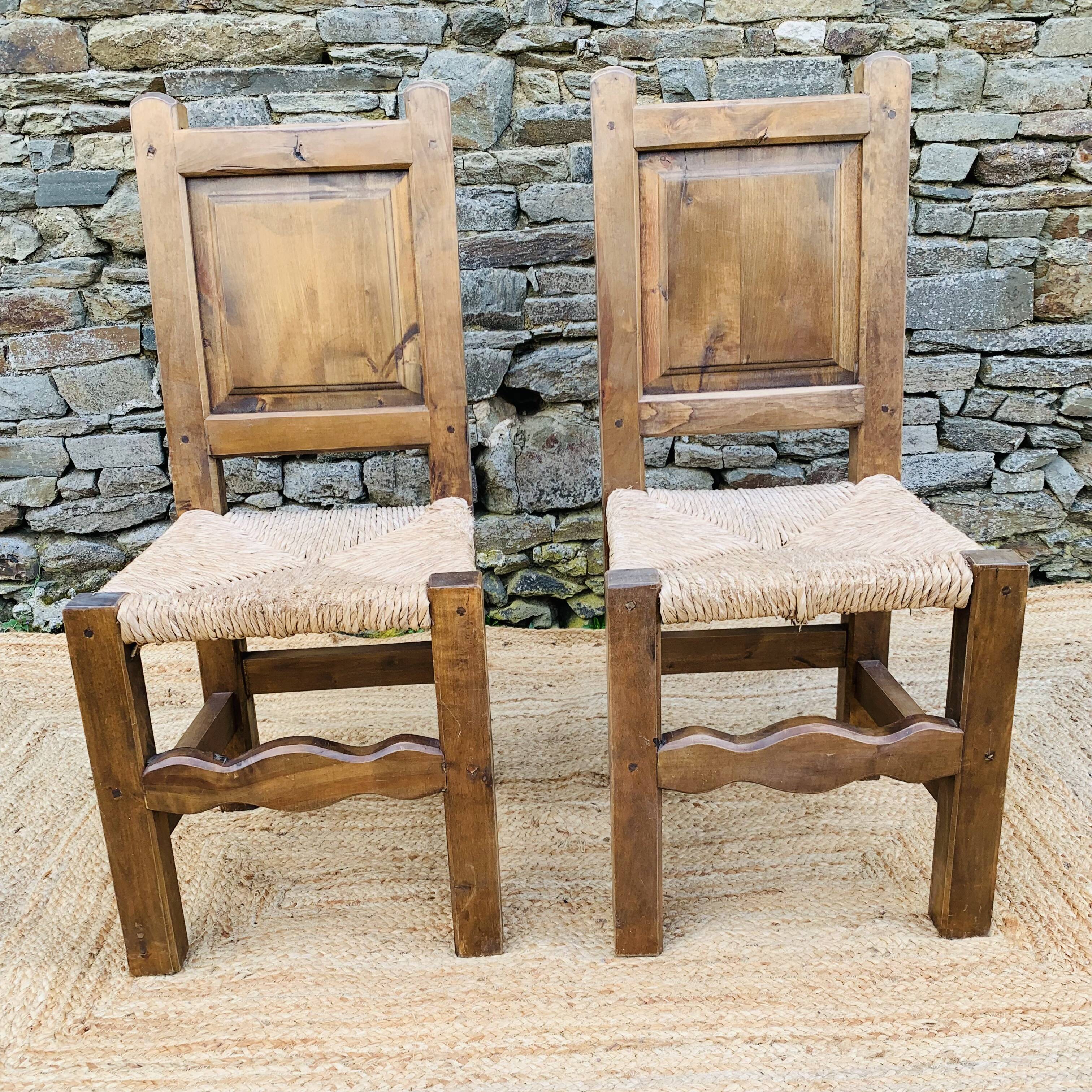 Pair of wooden and straw chairs