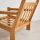 Brutalist armchair in oak and leather by Tage Poulsen, Denmark, 1970s.