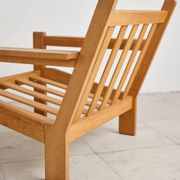 Brutalist armchair in oak and leather by Tage Poulsen, Denmark, 1970s.