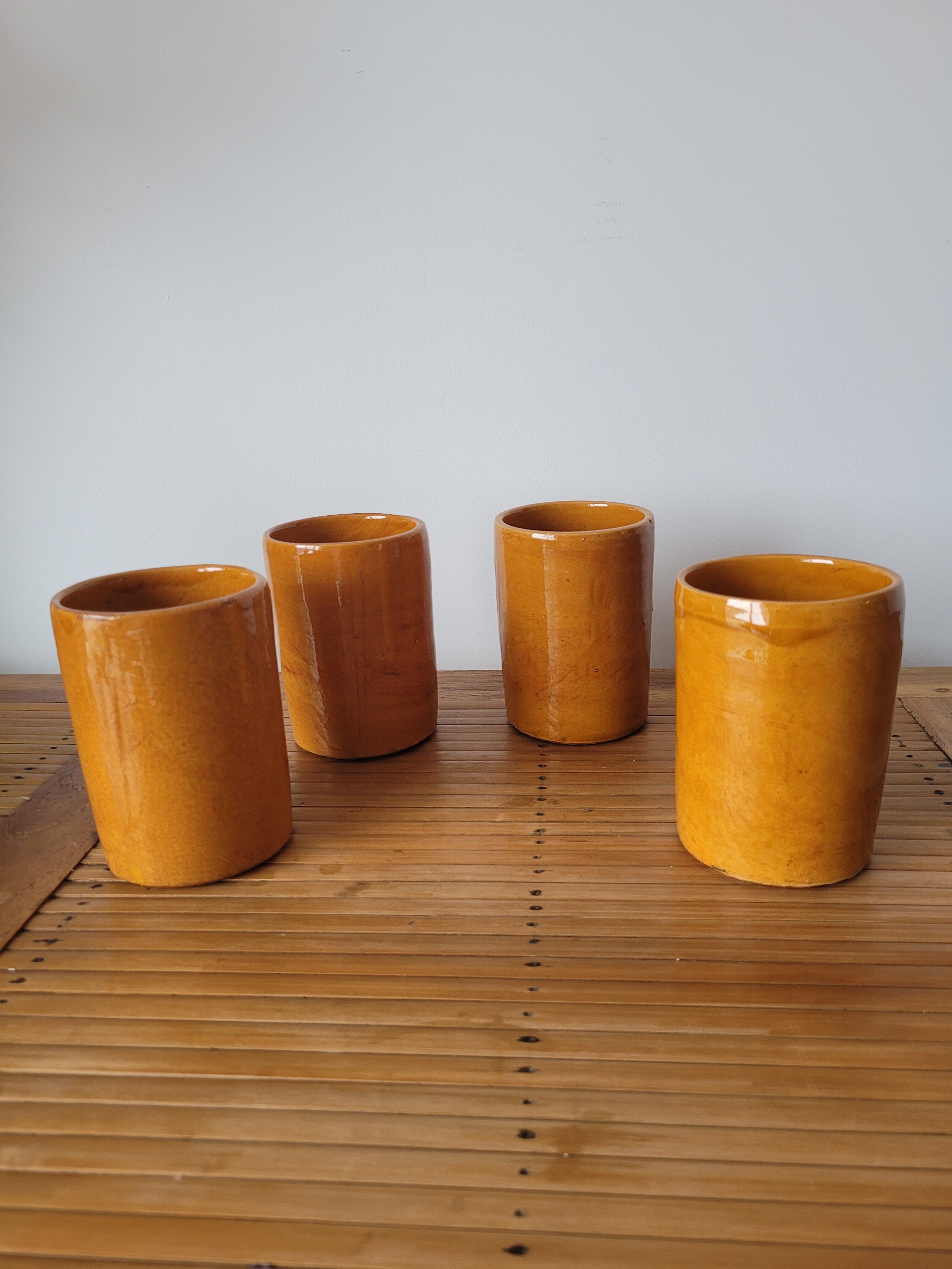 4 old glazed terracotta cups