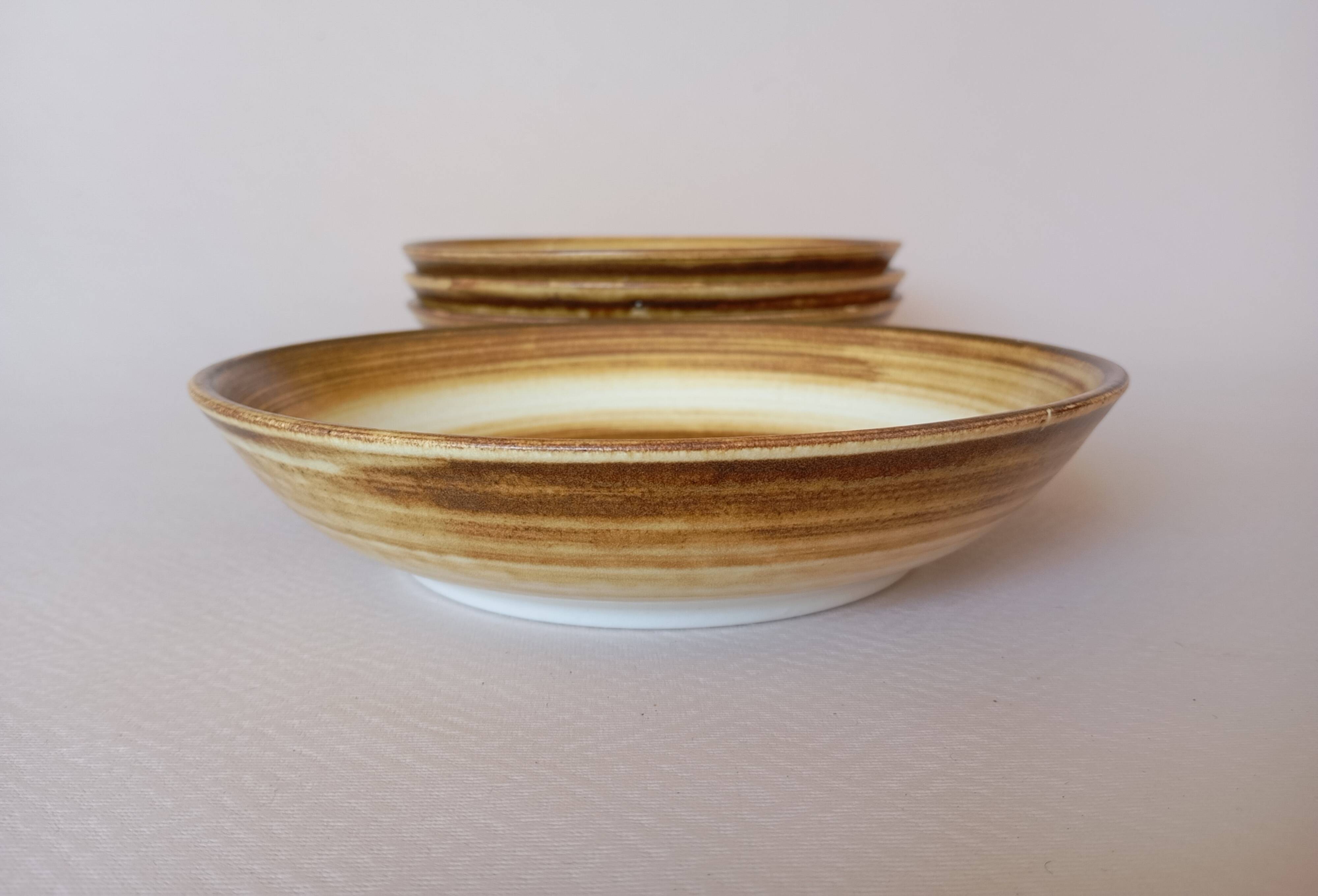 4 Longchamp calotte plates