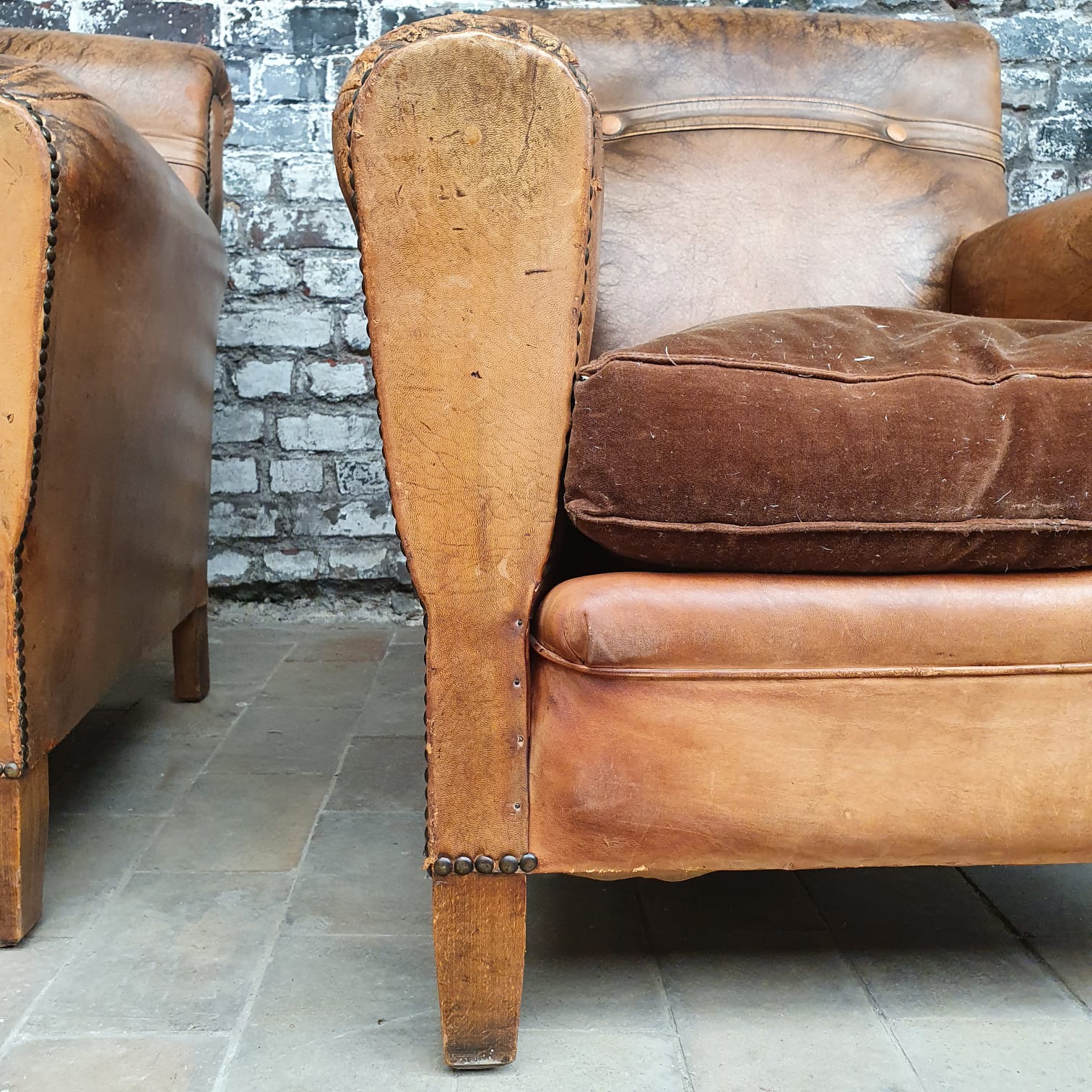 Pair of leather club chairs