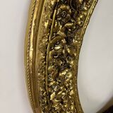 Large format golden oval frame