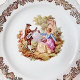 Large serving plate with romantic Frangonard scene with 24 carat gold