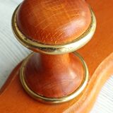 Wall-mounted coat rack in wood and brass