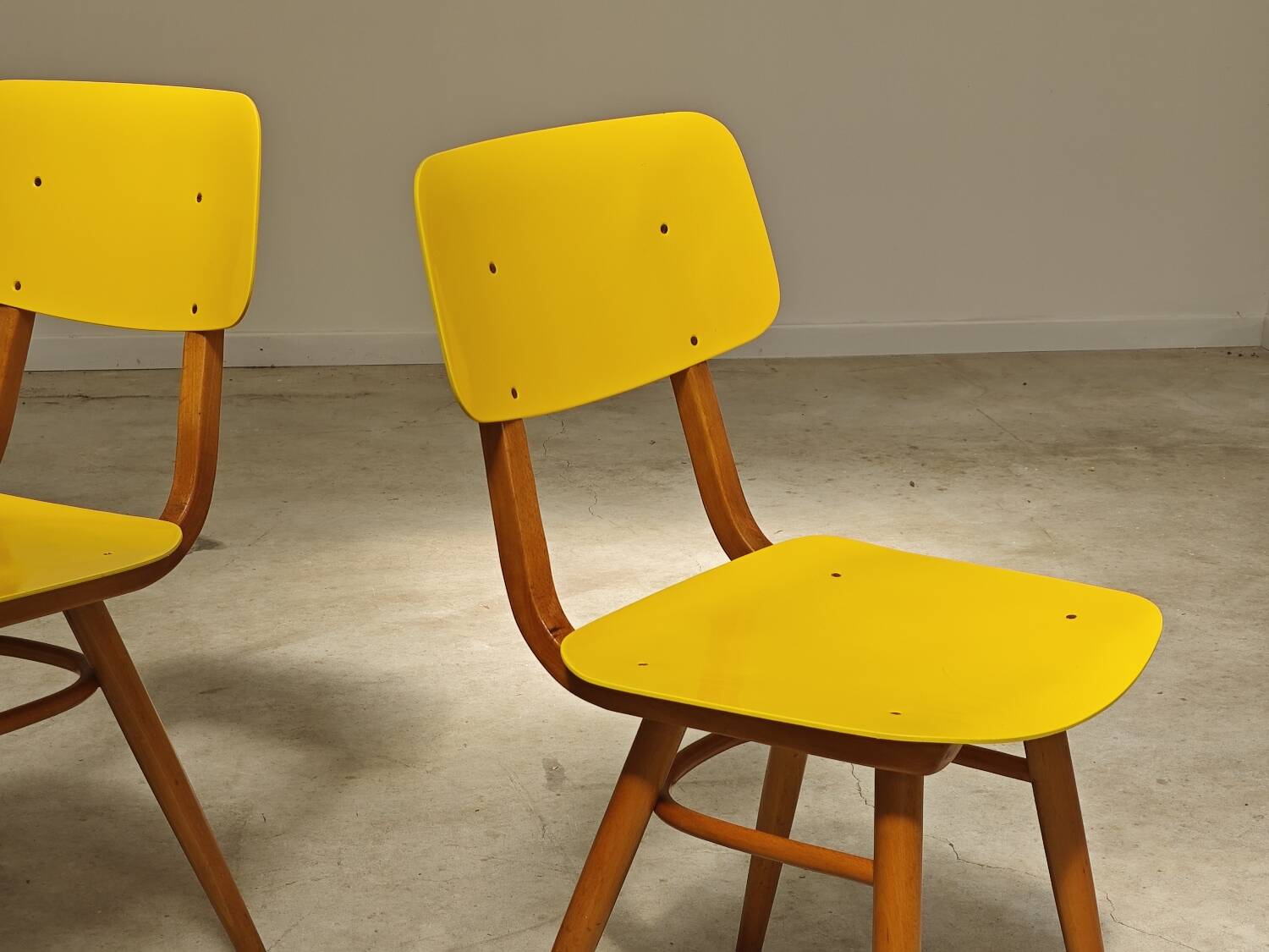 Pair of Ton Bystrice Thonet chairs in wood and yellow molded plastic