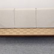 Scandinavian style three-seater sofa in teak, France circa 1950.