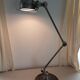 Jieldé lamp with 2 articulated metal arms, industrial style.