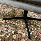 Swivel armchair in velvet fabric and metal