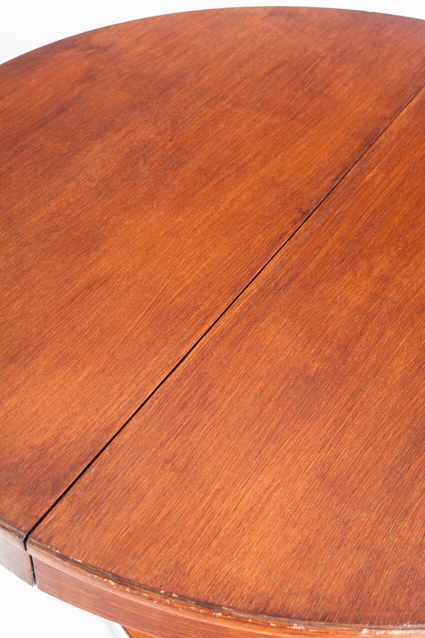 Dining table with a central extension. Vintage. Art Deco style. Varnished wood. France, 1960s.