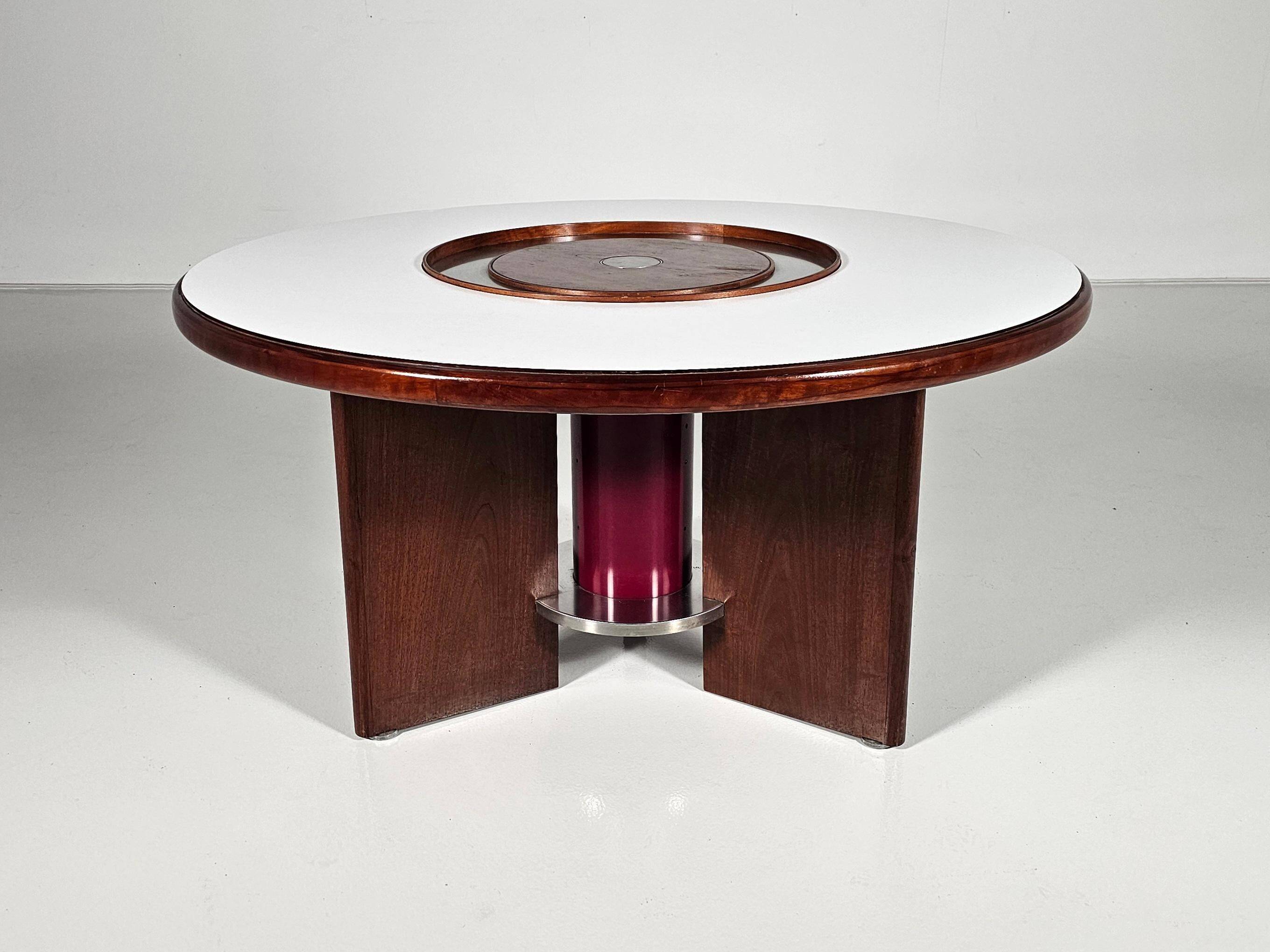 Dining table in walnut, laminate and steel by Silvio Coppola for Bernini, Italy.