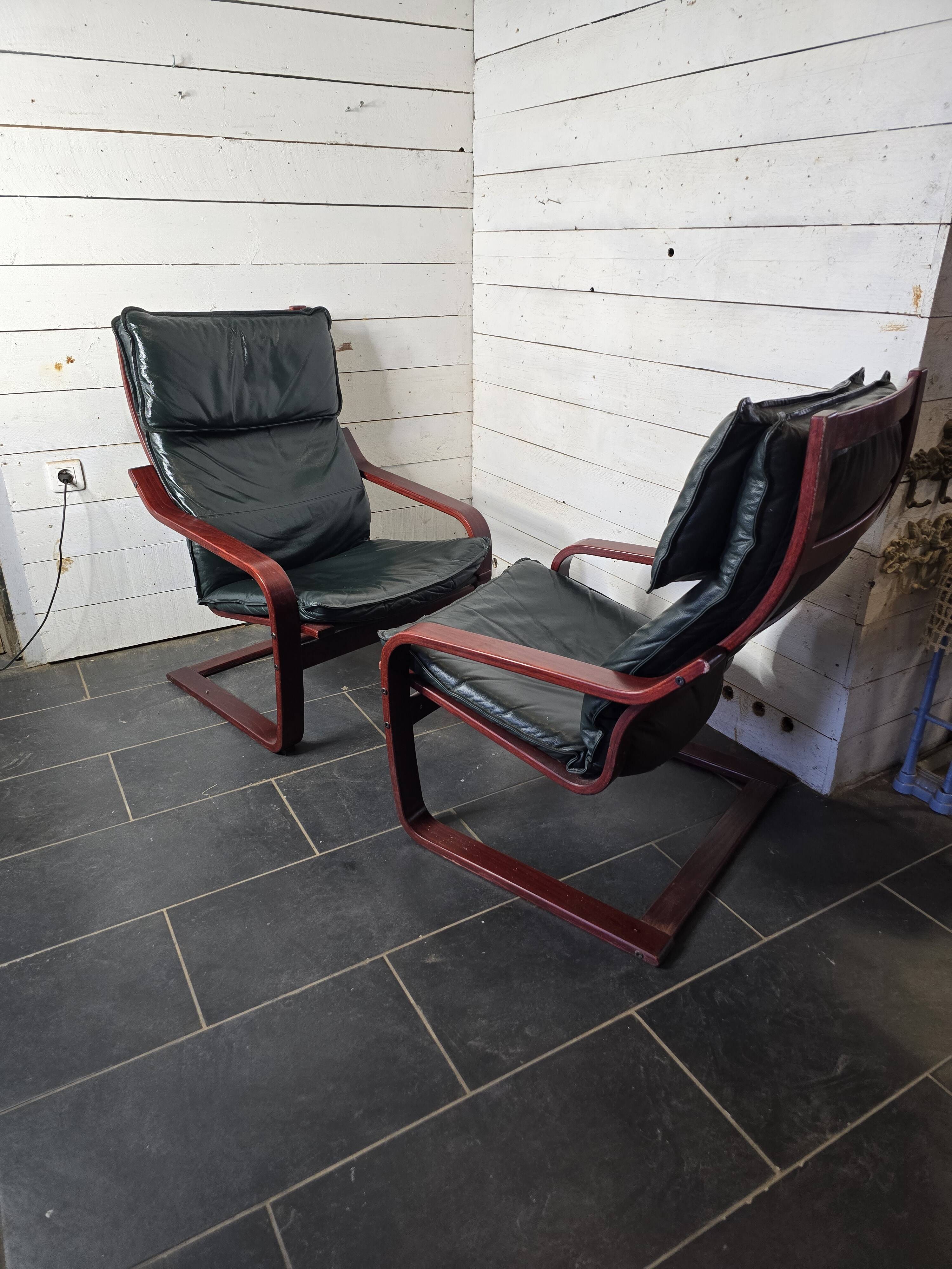 Pair of Scandinavian armchairs in leather and curved wood
