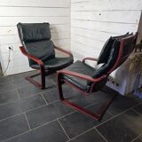 Pair of Scandinavian armchairs in leather and curved wood