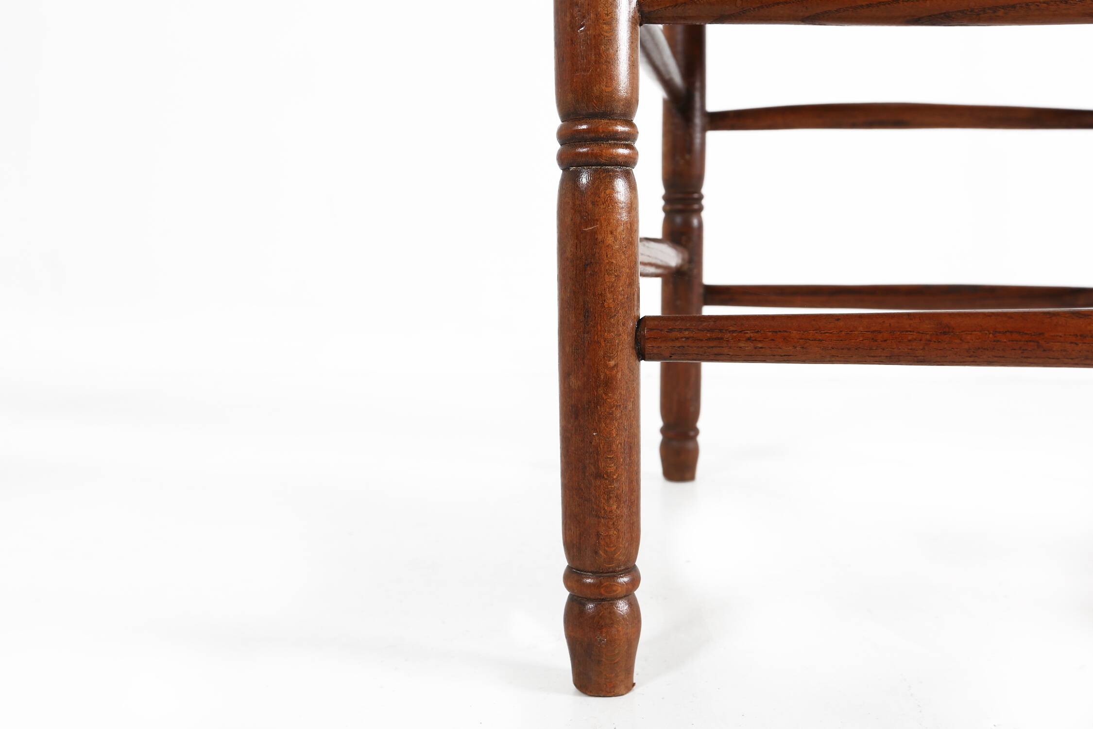Antique wooden armchair with cane seat, France ca. 1900