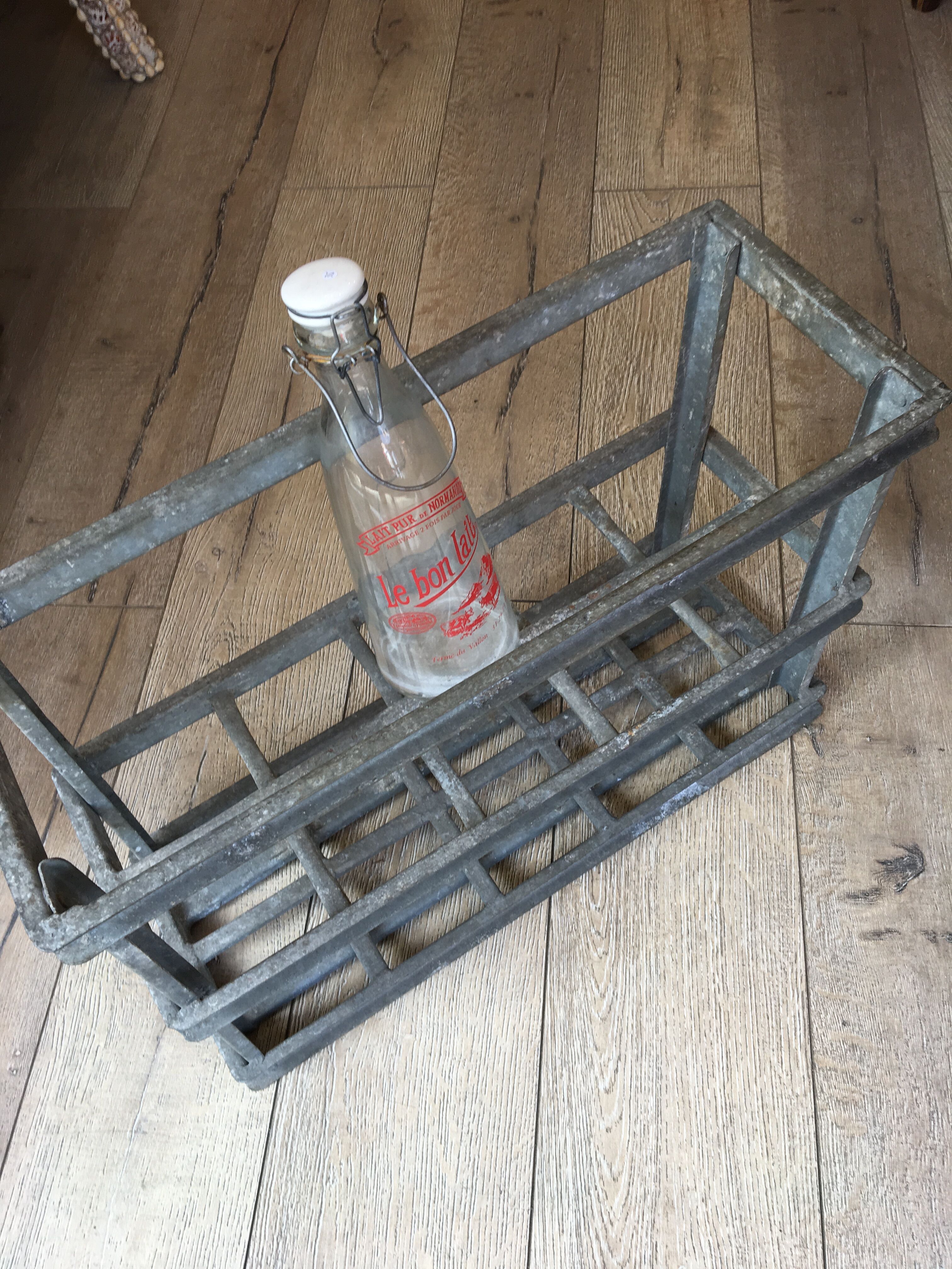 Old bottles in rectangular zinc locker