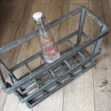 Old bottles in rectangular zinc locker