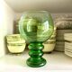 Vase boule en verre vert