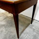 Louis XVI desk with green leather and shelves.