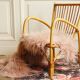 Children's rattan armchair & its old pink skin