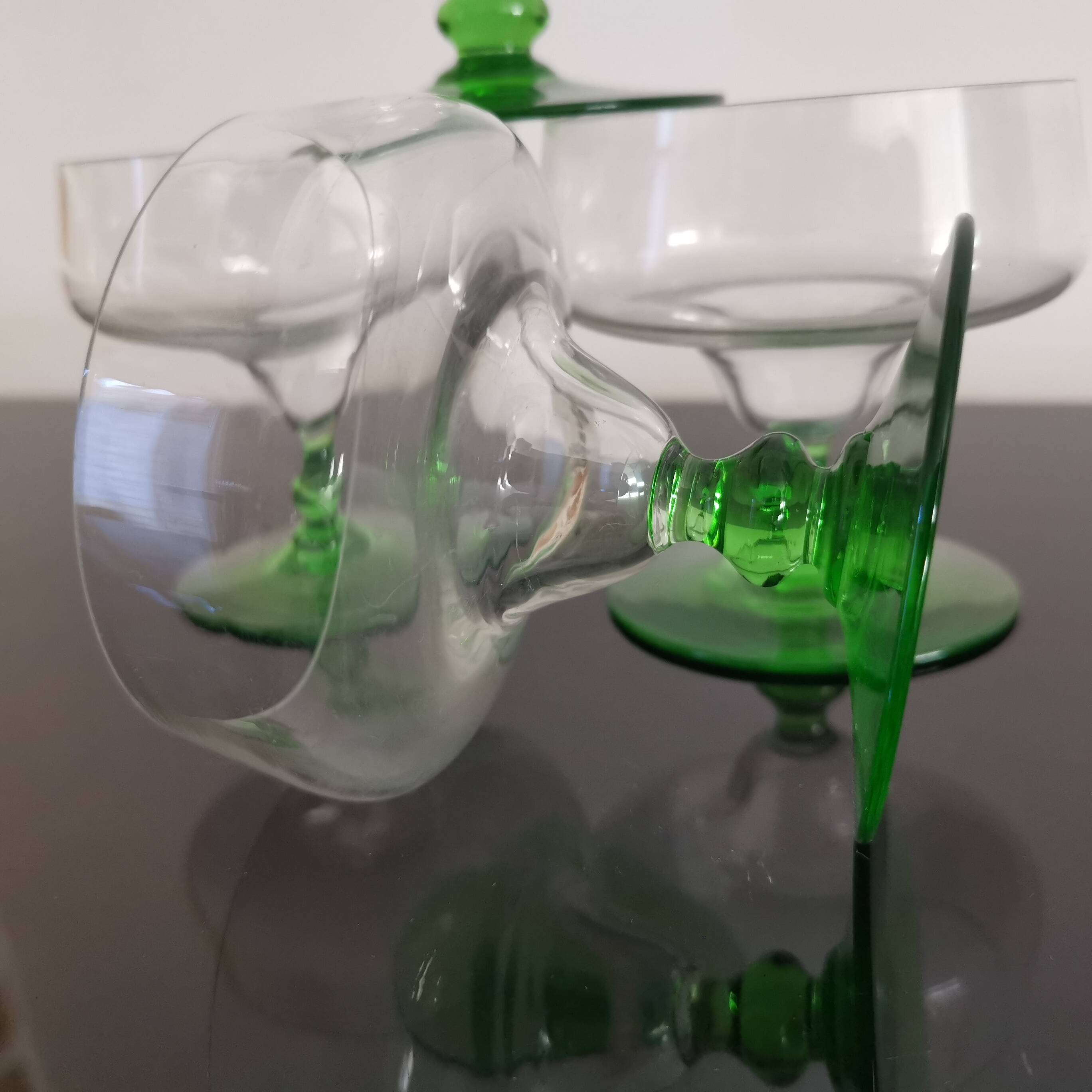 Set of 4 champagne glasses on green legs, 1960s