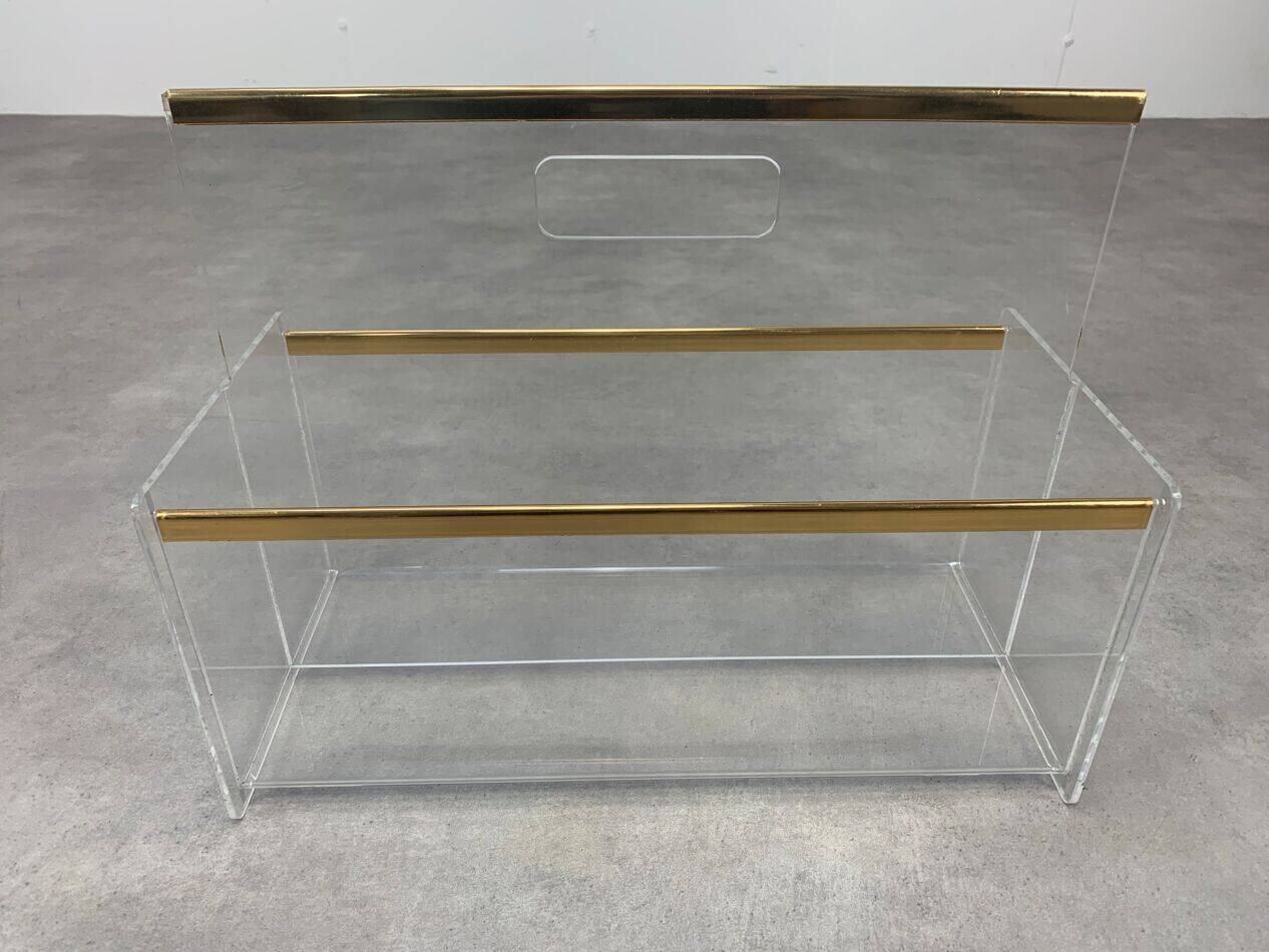 Plexiglass and brass magazine rack from the 70s in Hollywood Regency style.