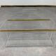 Plexiglass and brass magazine rack from the 70s in Hollywood Regency style.