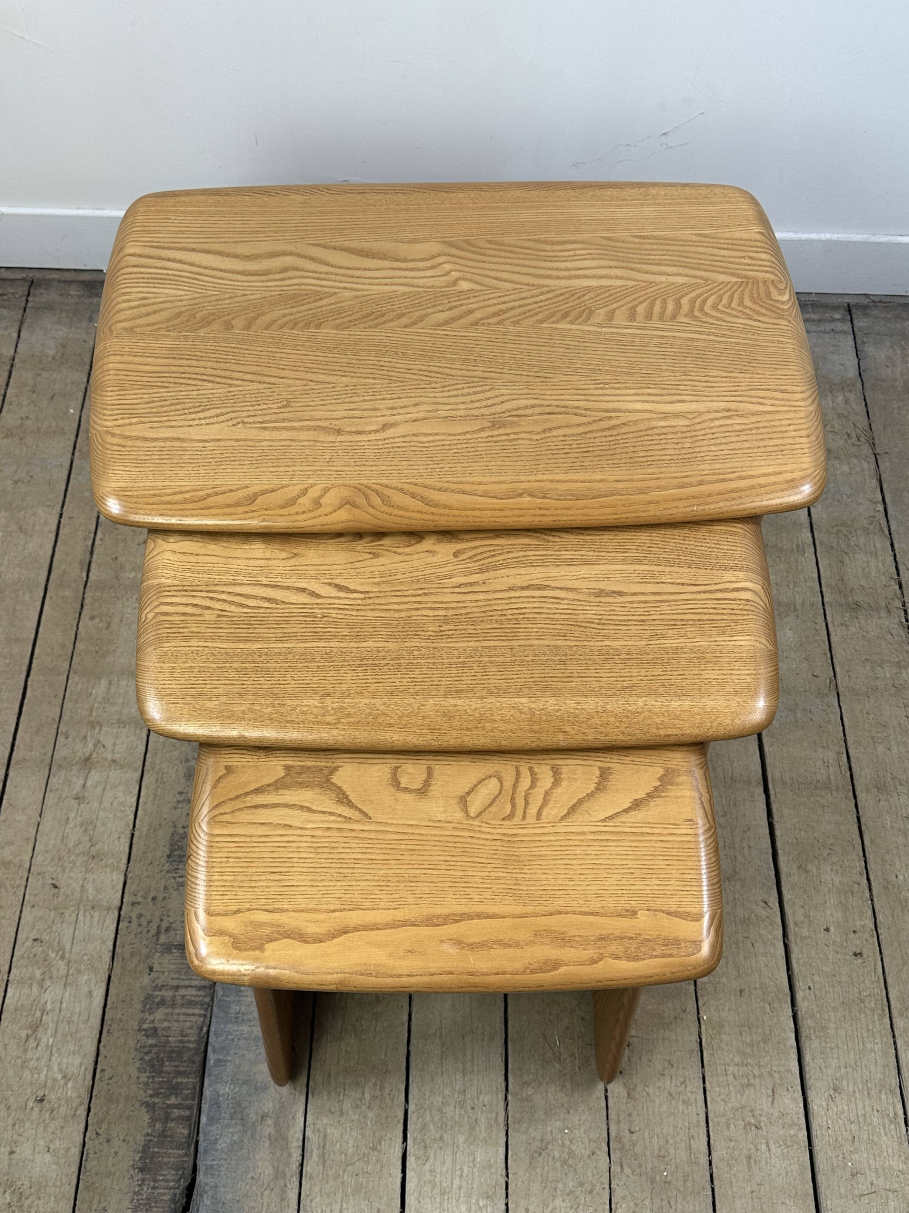 Vintage Ercol nesting tables in solid elm from the 1980s.