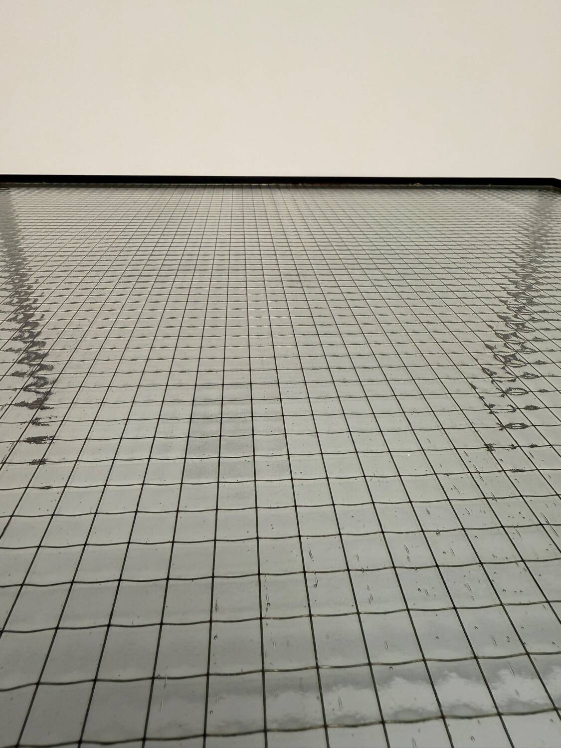 Old coffee table in metal and checkered glass from the 50s