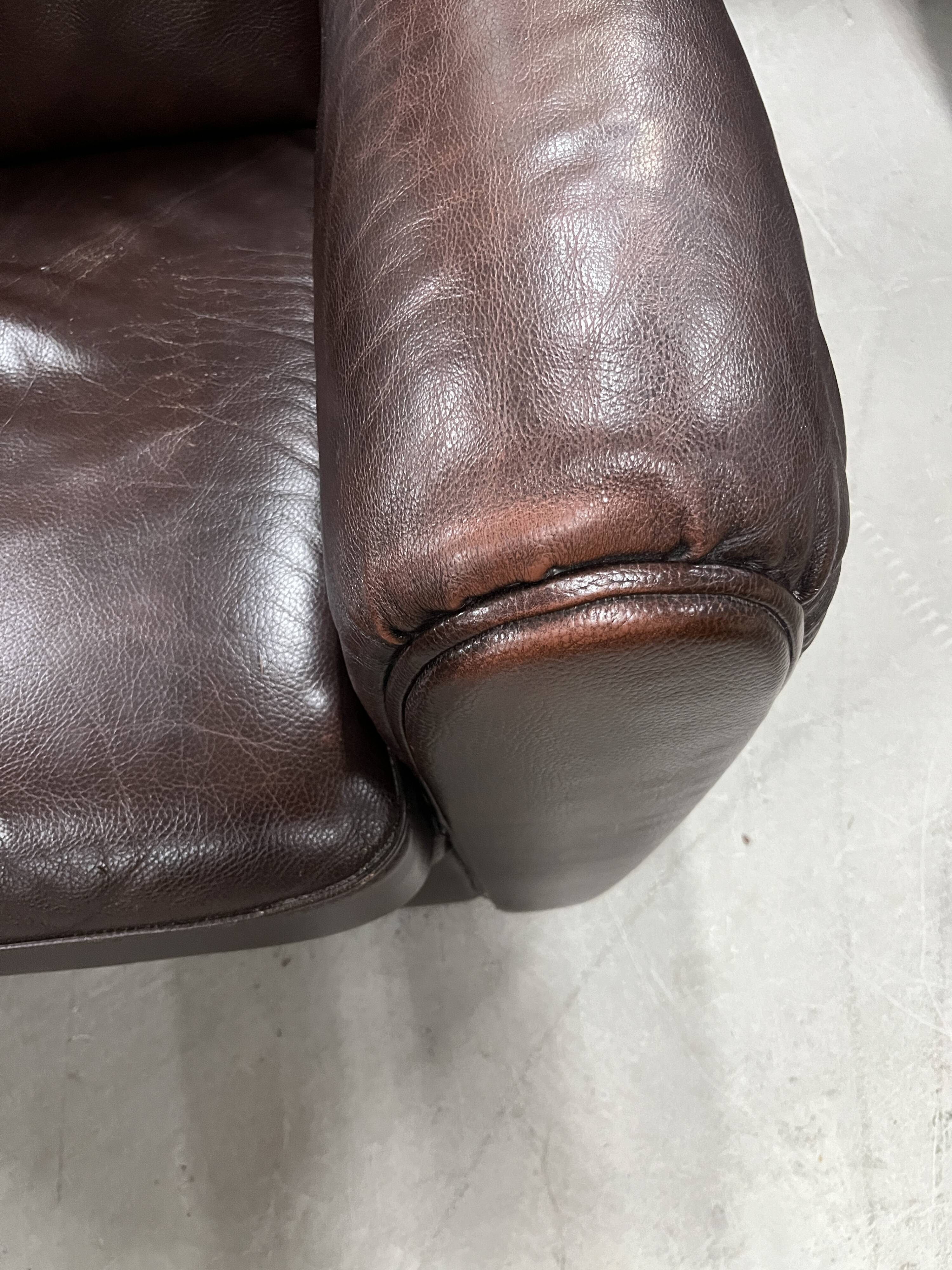 Brown leather club chair