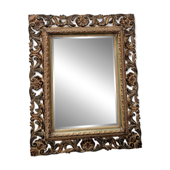 Napoleon III style mirror in carved wood, 20th century.