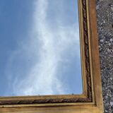 Golden trumeau mirror in Louis XVI style, 20th century.