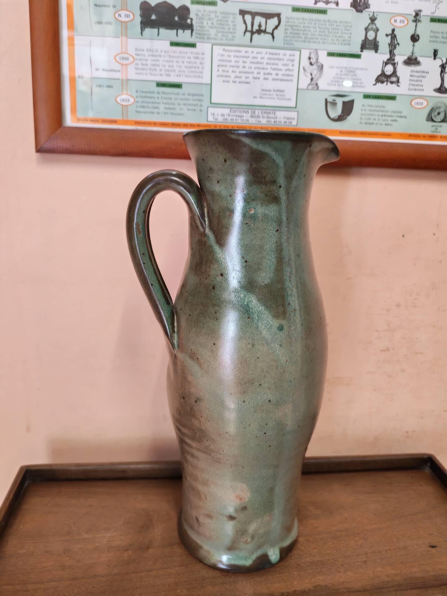 Set of three vintage ceramic jugs and a pitcher.