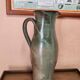 Set of three vintage ceramic jugs and a pitcher.